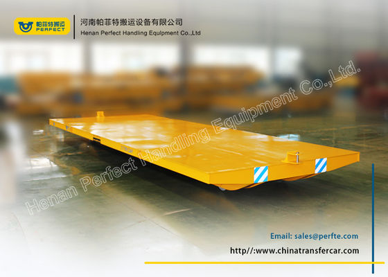 Yellow no - powered tow tailer for industrial assembly line with moving platform